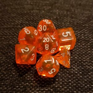 a pile of 7 polyhedral dice on a dark grey background. The dice are clear orange, and have white inked numbers.
